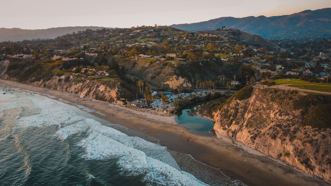 Santa Barbara coastline with bluffs, beach and hillside homes